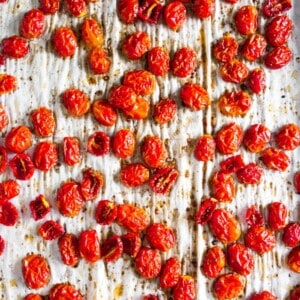 These slow roasted cherry tomatoes are made in the oven and come out sweet and delicious. Ready in 3 hours and perfect for pasta, salad, sandwiches or even for mid-day snacking.