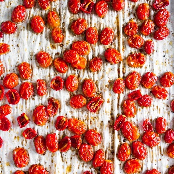 These slow roasted cherry tomatoes are made in the oven and come out sweet and delicious. Ready in 3 hours and perfect for pasta, salad, sandwiches or even for mid-day snacking.