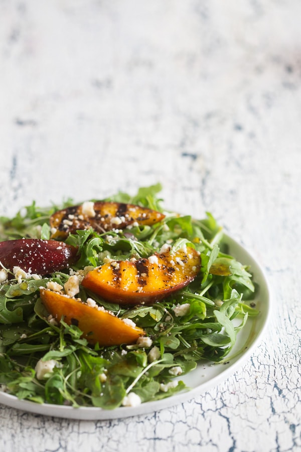 Grilled Nectarine Salad on a white plate. 