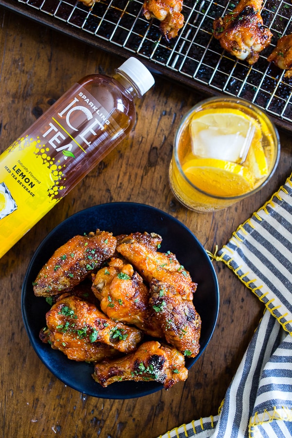 These sweet and spicy honey sriracha chicken wings are the perfect game day appetizer or weeknight dinner. Baked in the oven so they come out super crispy and glazed to perfection.