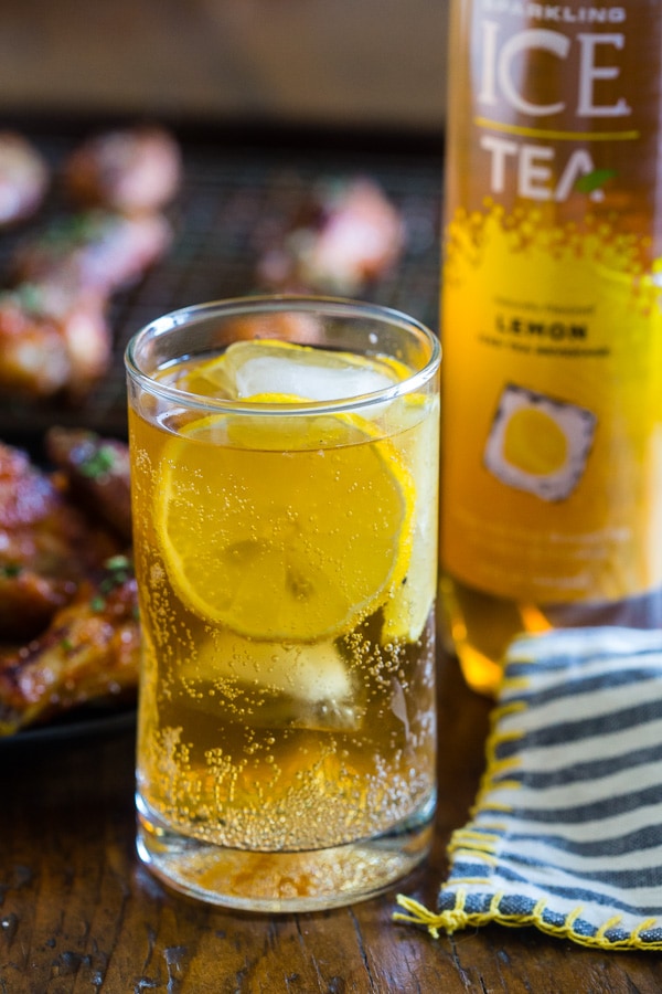 These sweet and spicy honey sriracha chicken wings are the perfect game day appetizer or weeknight dinner. Baked in the oven so they come out super crispy and glazed to perfection.