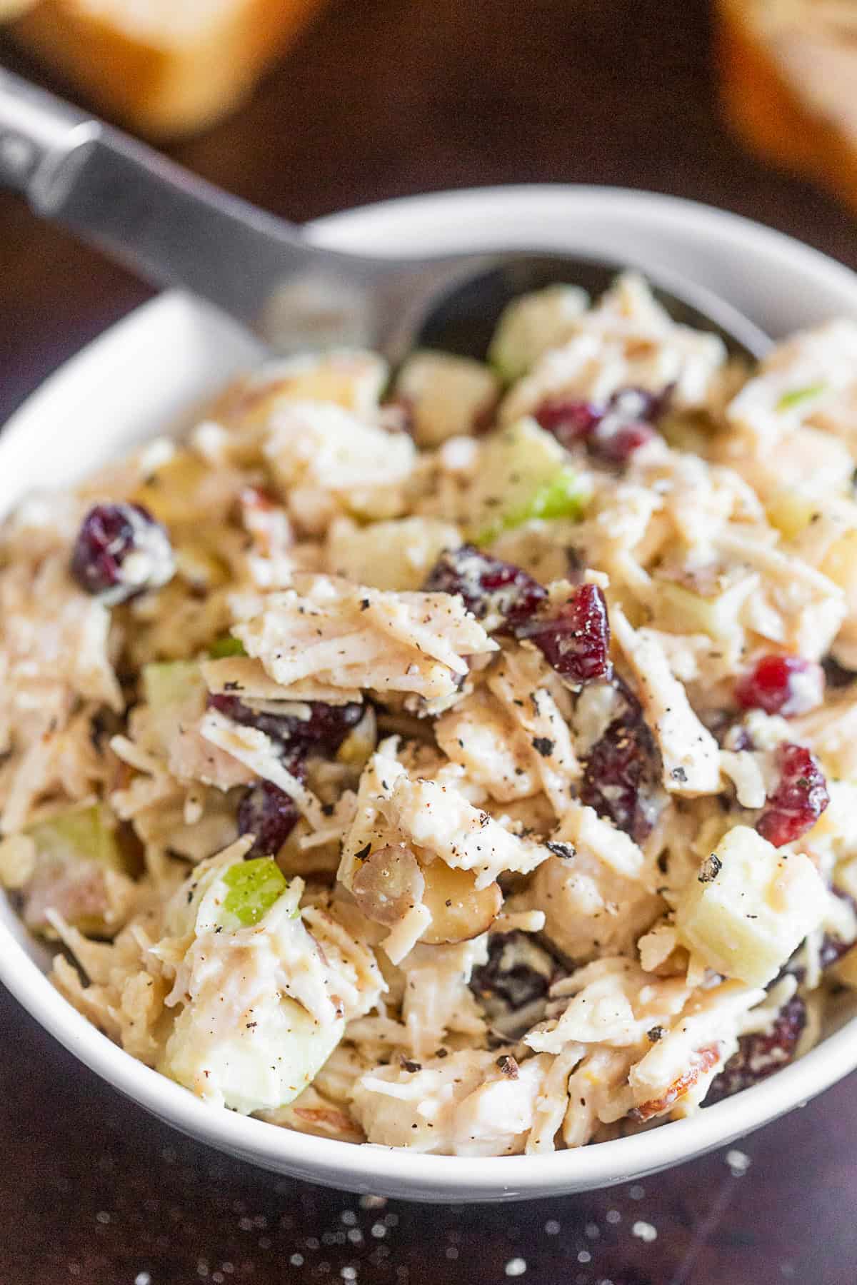Hummus Chicken Salad in a bowl with pepper on top.