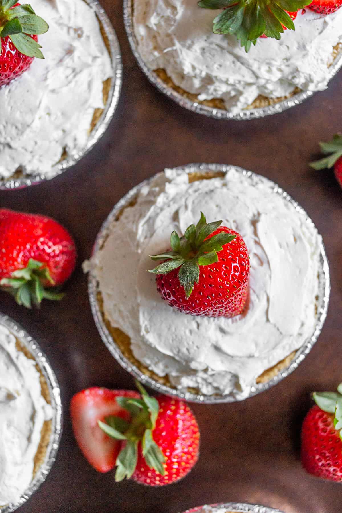 No Bake Strawberry Tarts topped with berries. 