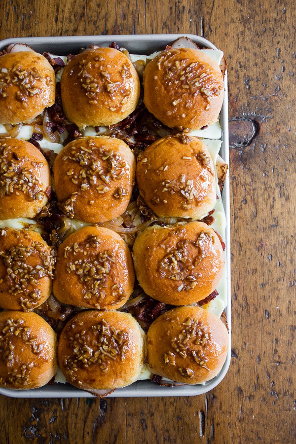 Baked Turkey Bacon Onion Sandwiches glazed with topping.