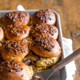 These baked turkey bacon onion sandwiches are the perfect party food. Made with maple mayo and lots of bacon, caramelized onions, melty cheese and turkey. You'll love these delicious sandwiches!