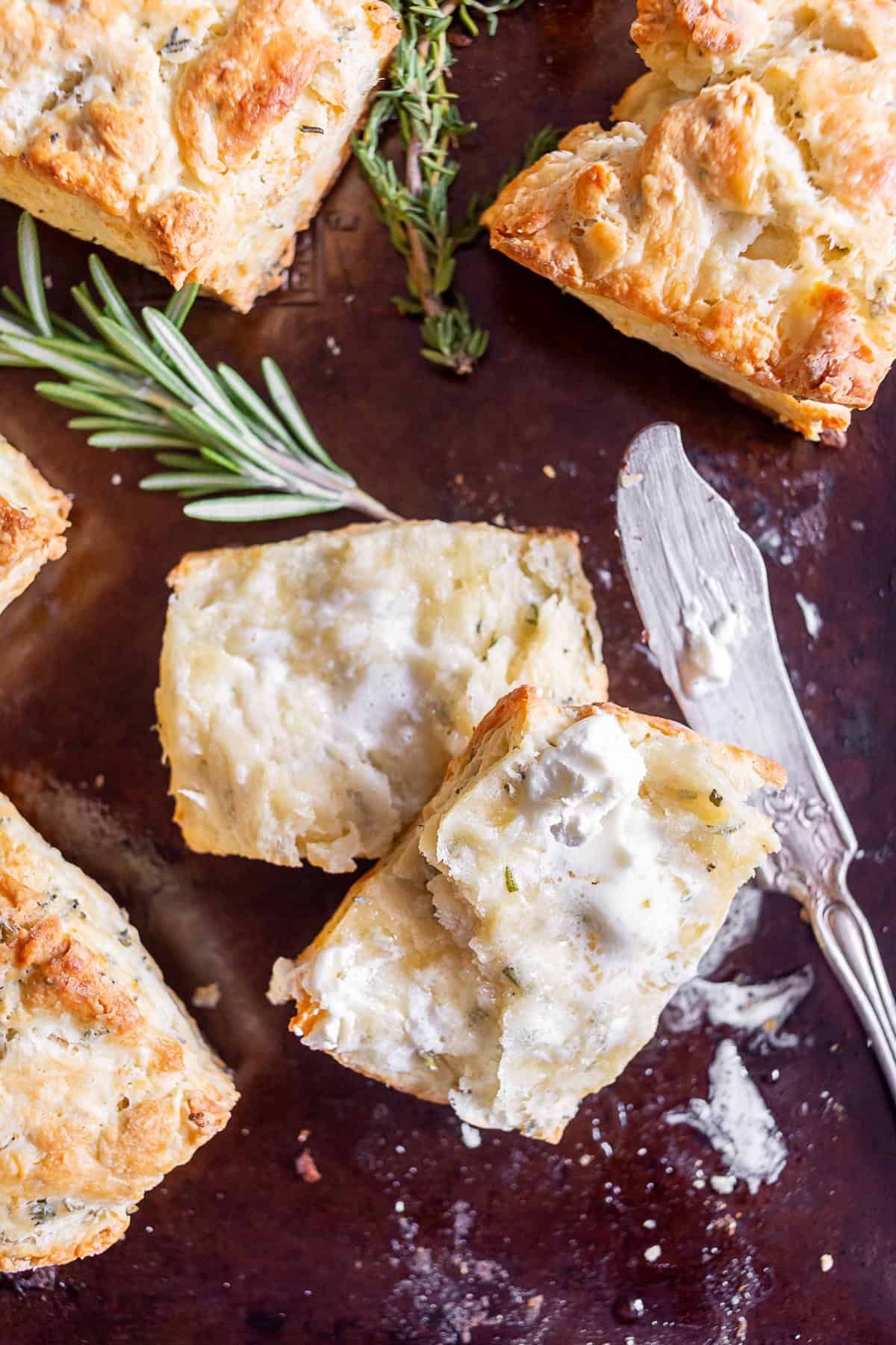 Homemade Herb Biscuits spread with whipped butter. 