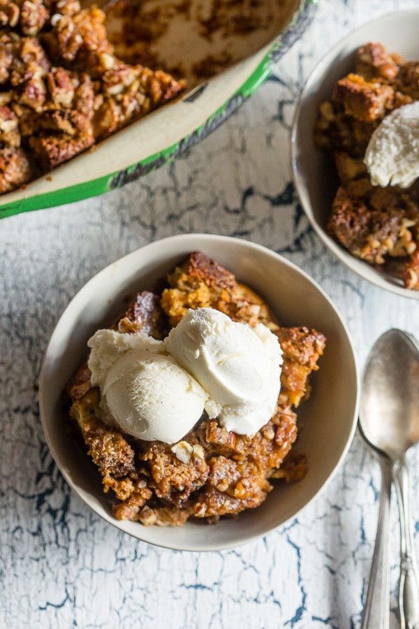This pumpkin cream cheese bread pudding is not only gluten-free but it's packed full of fall flavor and perfect when served with a scoop of vanilla ice cream. Plus the pumpkin bread is soaked in a cream cheese mixture so you know it's bound to be delicious!