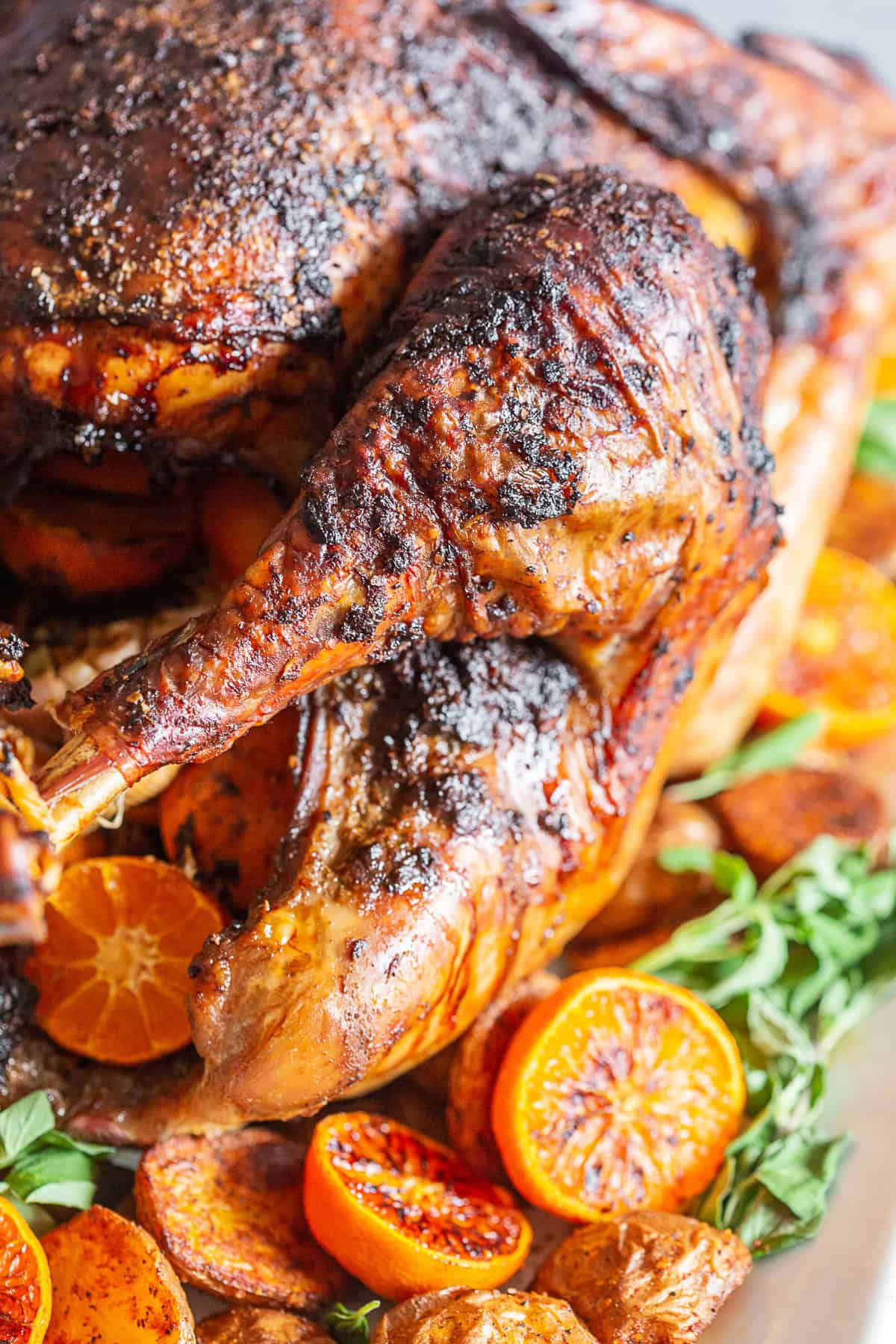 A stuffed Adobo Butter Turkey on a serving platter. 
