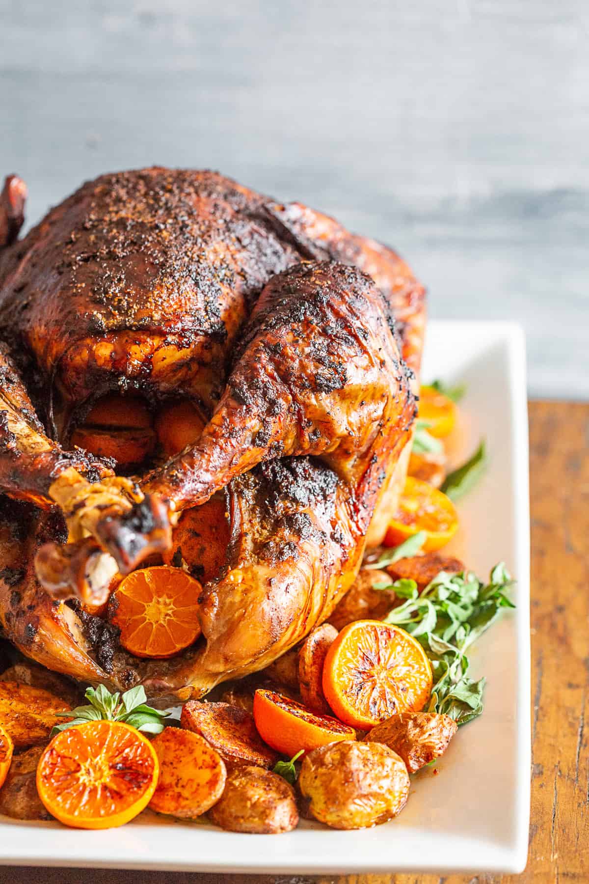 Adobo Butter Turkey sitting on a platter. 
