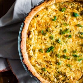 This bacon onion herb quiche is packed full of flavor and perfect for breakfast, brunch or even dinner! Read in just an hour and can be served hot from the oven or room temperature. You're going to love how easy this quiche is to prepare!