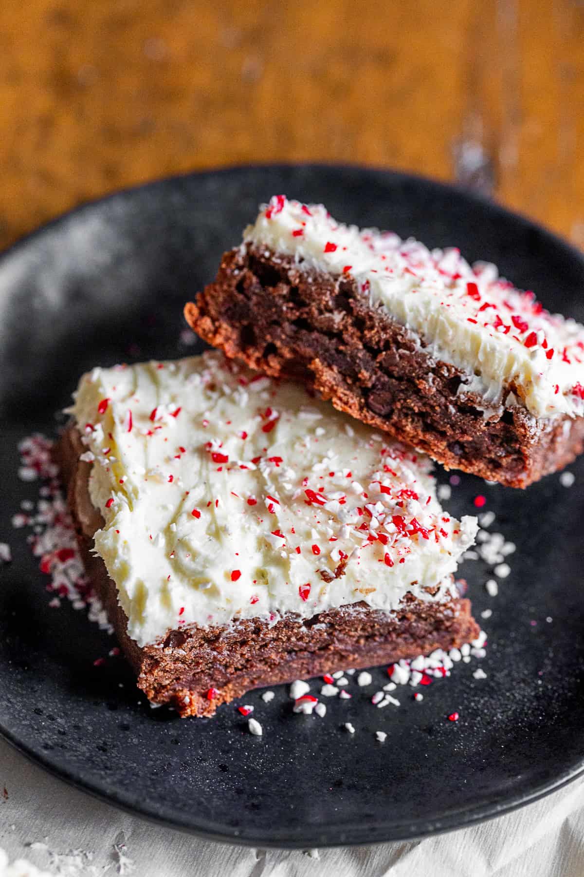 Easy Peppermint Brownies on a small black plate. 