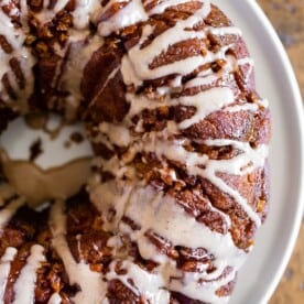 pumpkin spice apple monkey bread on a white plate
