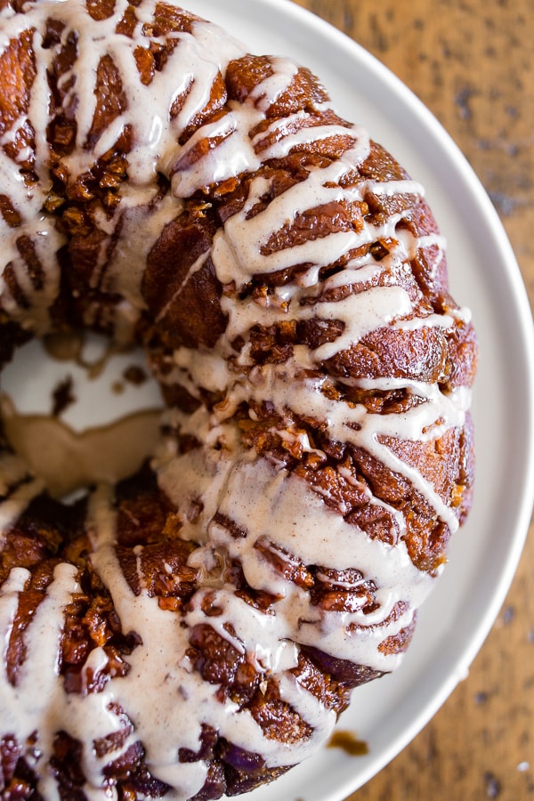 pumpkin spice apple monkey bread on a white plate