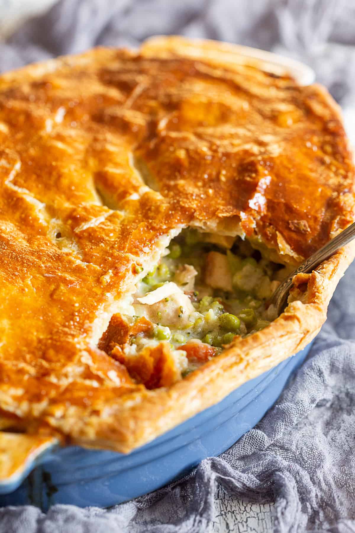 Puff Pastry Turkey Pot Pie in a blue dish. 