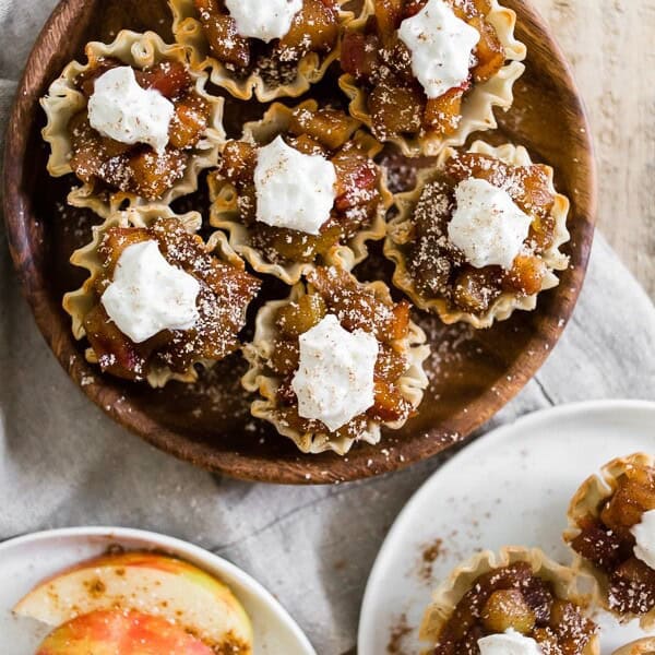 These vanilla bean apple pie phyllo bites are a sweet little treat that deserves to be at your Thanksgiving table. Super easy to make and requires ZERO baking! Top with whipped cream or ice cream - your choice!