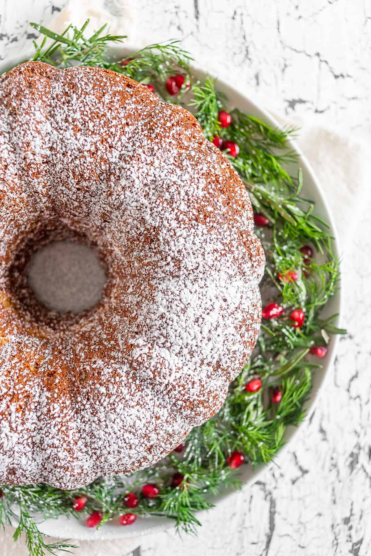 Cream Sherry bundt cake sitting on a cake plate