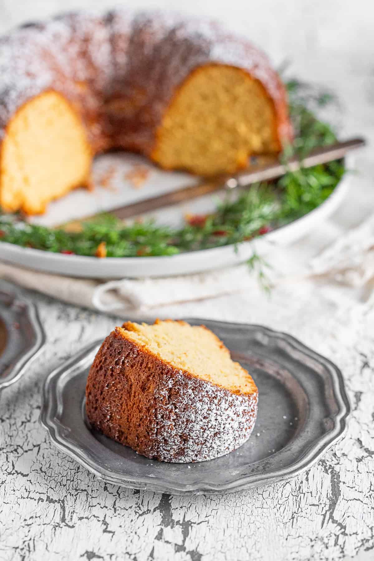 a close up slice of cream sherry bundt cake