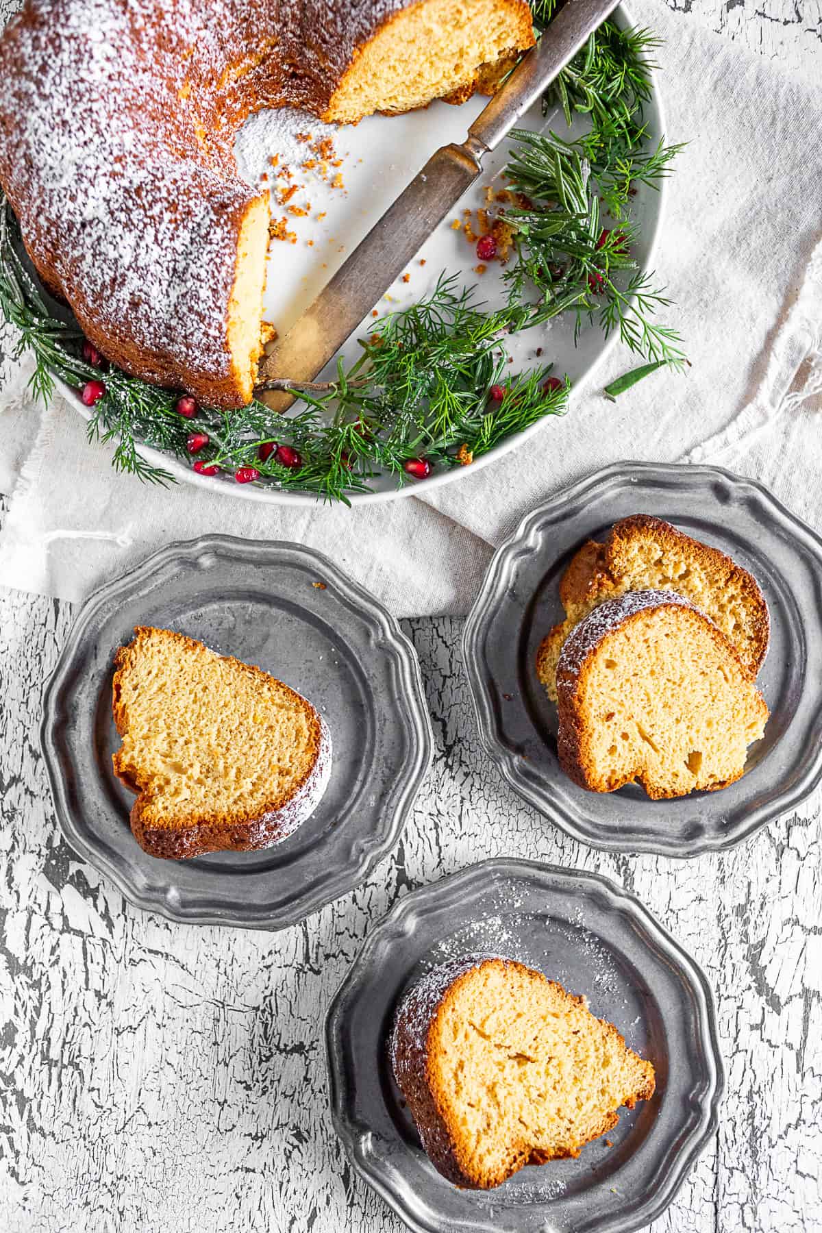 Slices of cream sherry bundt cake sitting on serving plates