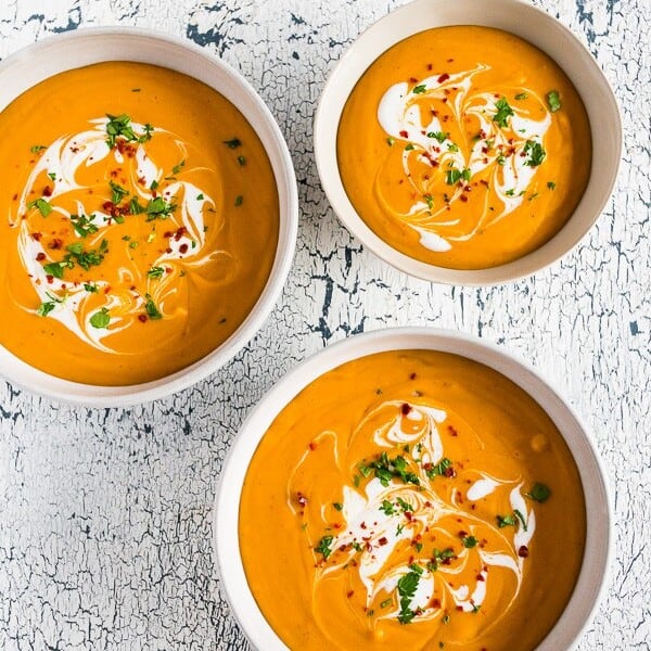 This creamy red lentil carrot soup is ready in just 30 minutes and is the perfect easy holiday and weeknight rush dinner. Keep it vegan by skipping the Greek yogurt topping or give yourself a big dollop - the choice is totally yours!
