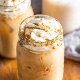 Horchata Coffee iced with whipped cream on top.