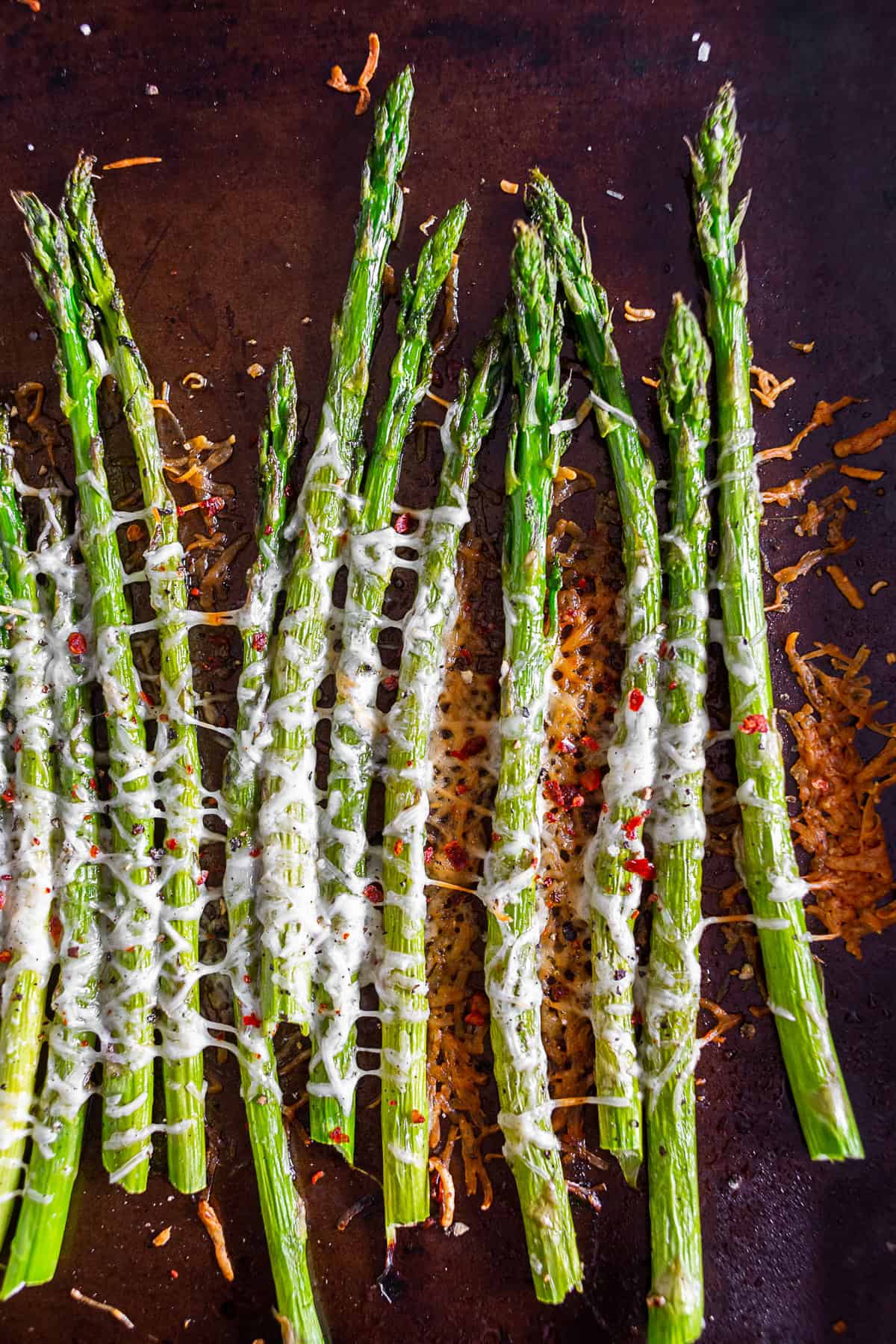 Parmesan Roasted Asparagus on a sheet pan. 