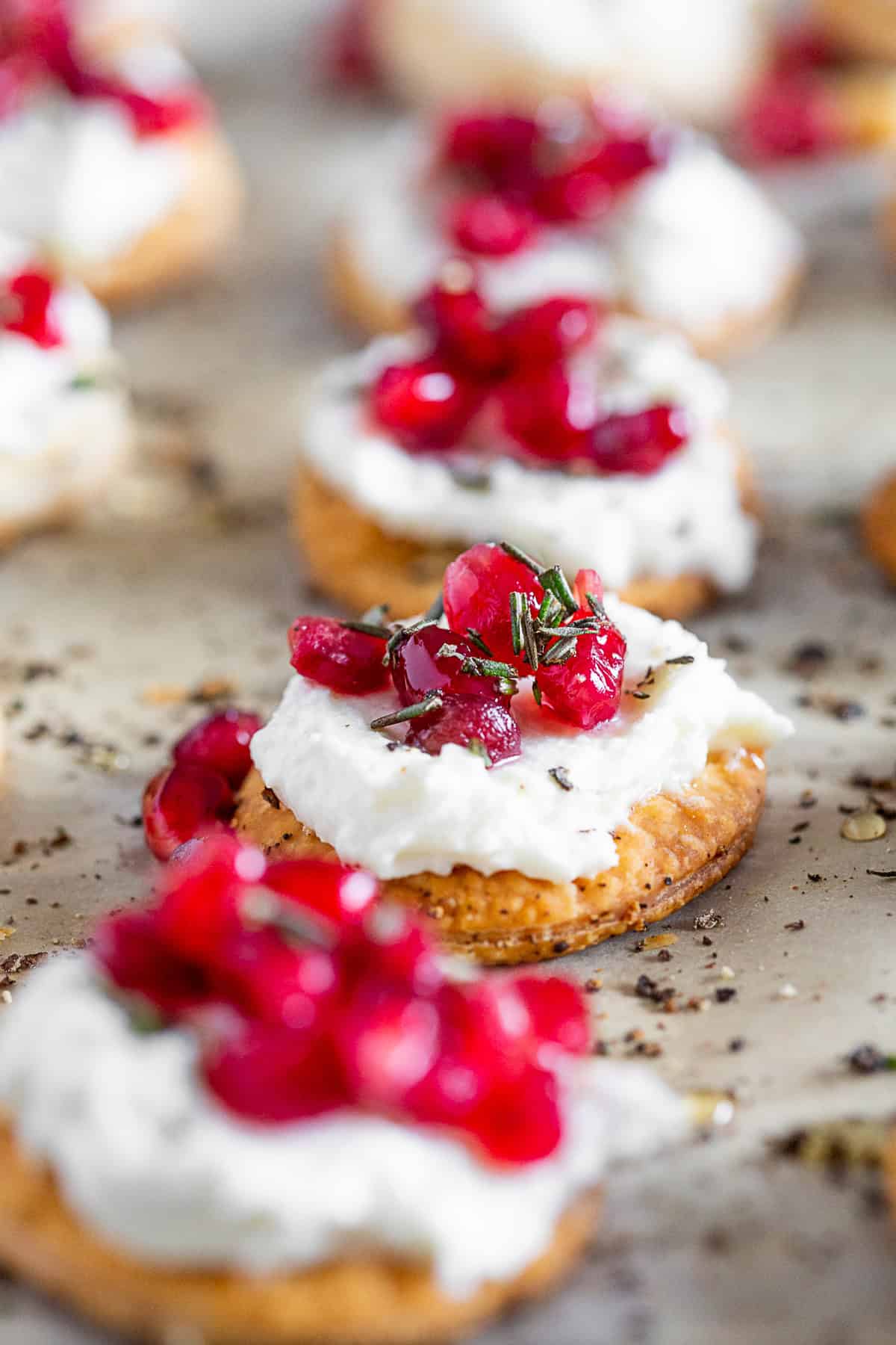 Whipped Goat Cheese Bites topped with extra rosemary. 