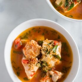 This 20 minute seafood stew has a light broth made from tomatoes, garlic, fresh herbs and white wine. Plus it's packed full of fresh cod and shrimp.
