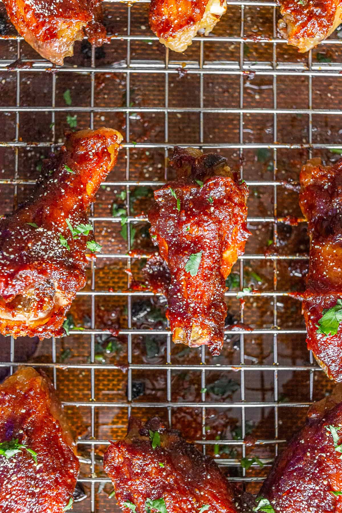 Close up of crispy baked chicken wing.