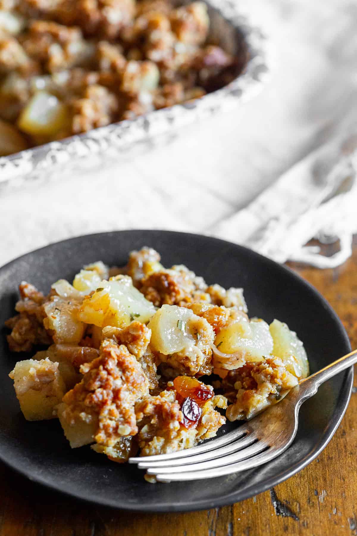 Rosemary Asian Pear Crisp spooned onto a plate.