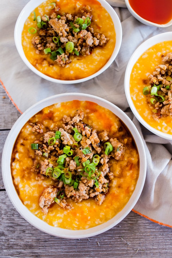 This pressure cooker butternut squash congee is topped with ground pork flavored with ginger, lemongrass, garlic, soy sauce and hot chili oil. This dish is 100% comfort food and can be enjoyed for breakfast, lunch or dinner. You'll love that it's ready in just 30 minutes by using your pressure cooker or Instant Pot.