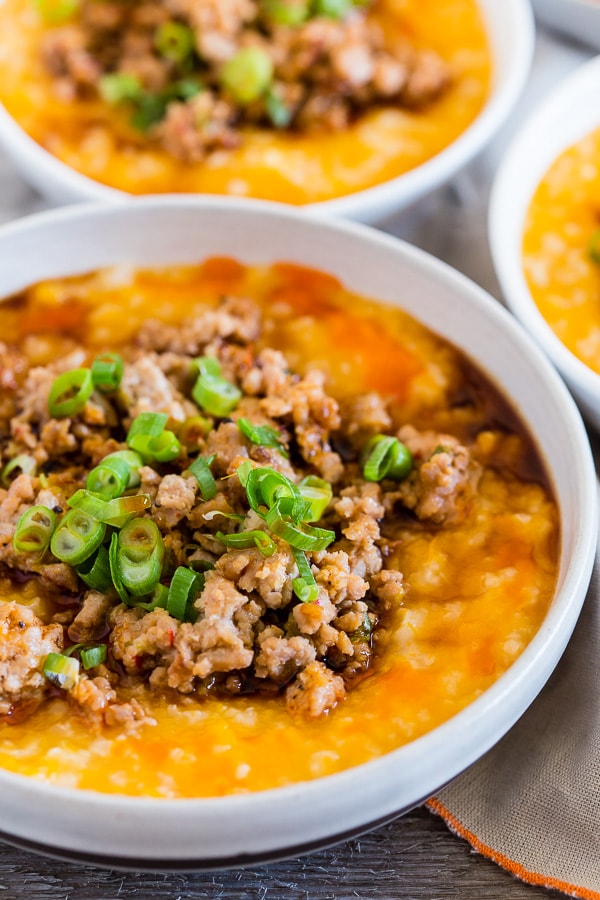 This pressure cooker butternut squash congee is topped with ground pork flavored with ginger, lemongrass, garlic, soy sauce and hot chili oil. This dish is 100% comfort food and can be enjoyed for breakfast, lunch or dinner. You'll love that it's ready in just 30 minutes by using your pressure cooker or Instant Pot.