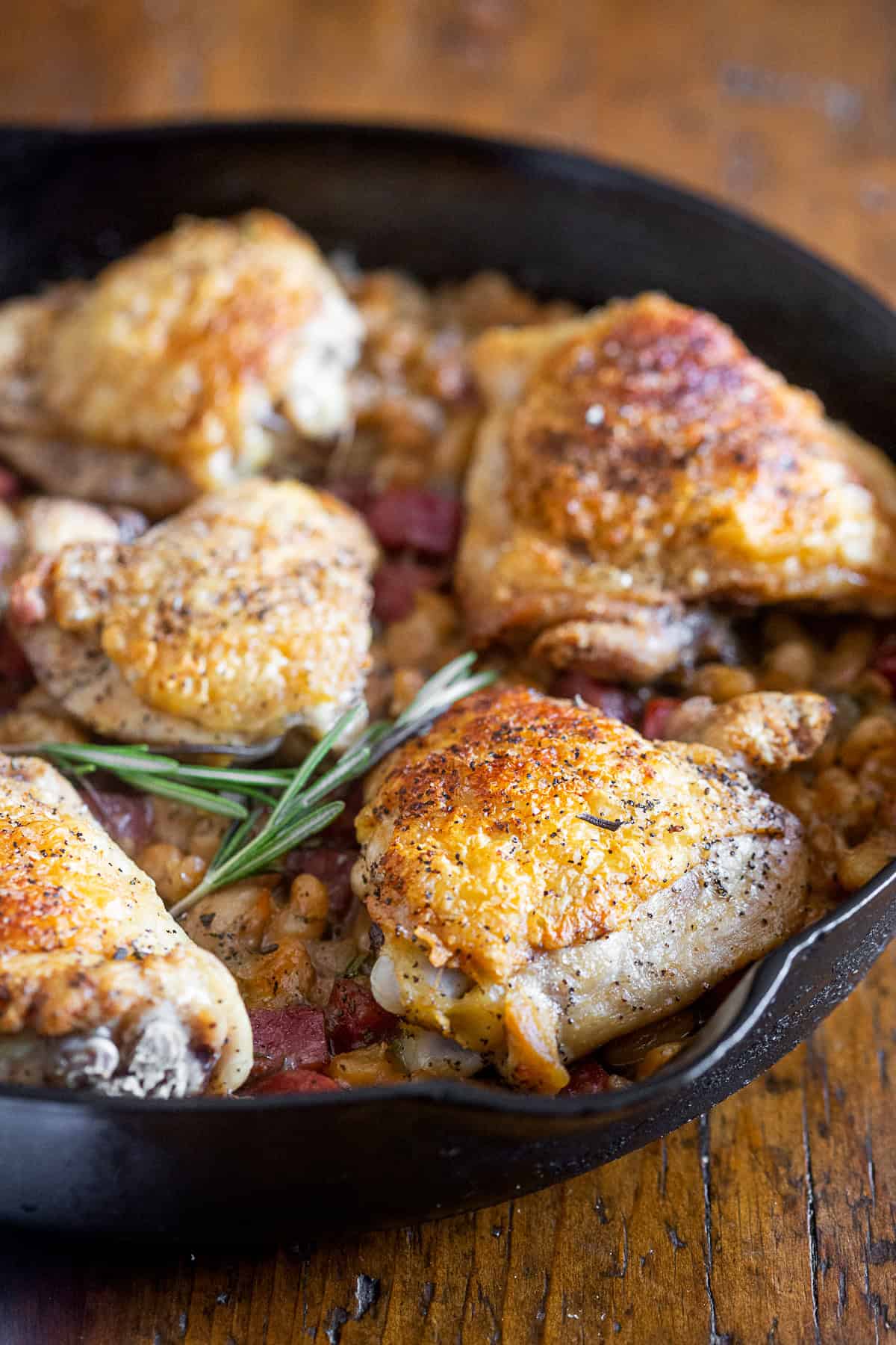 Chicken Cannellini Bean Skillet topped with extra rosemary. 