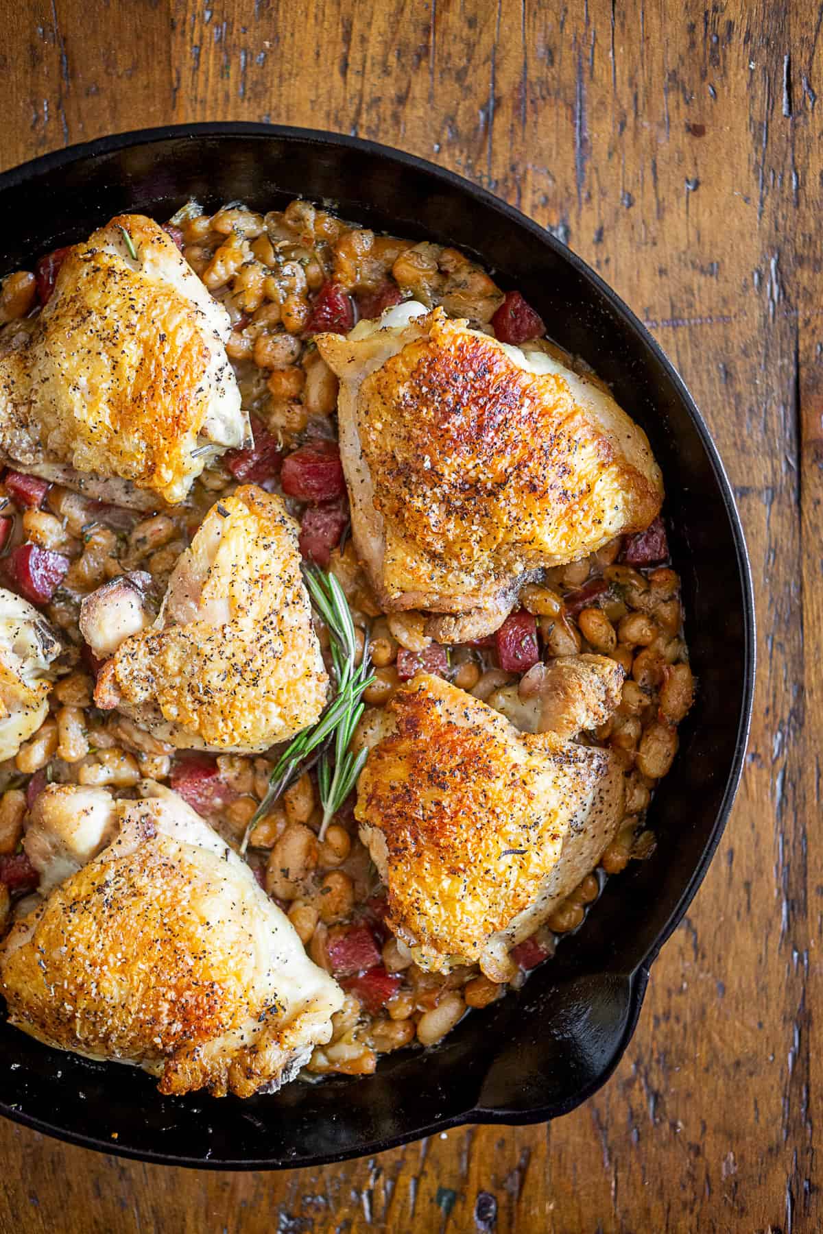 Chicken Cannellini Bean Skillet in a large cast iron skillet. 