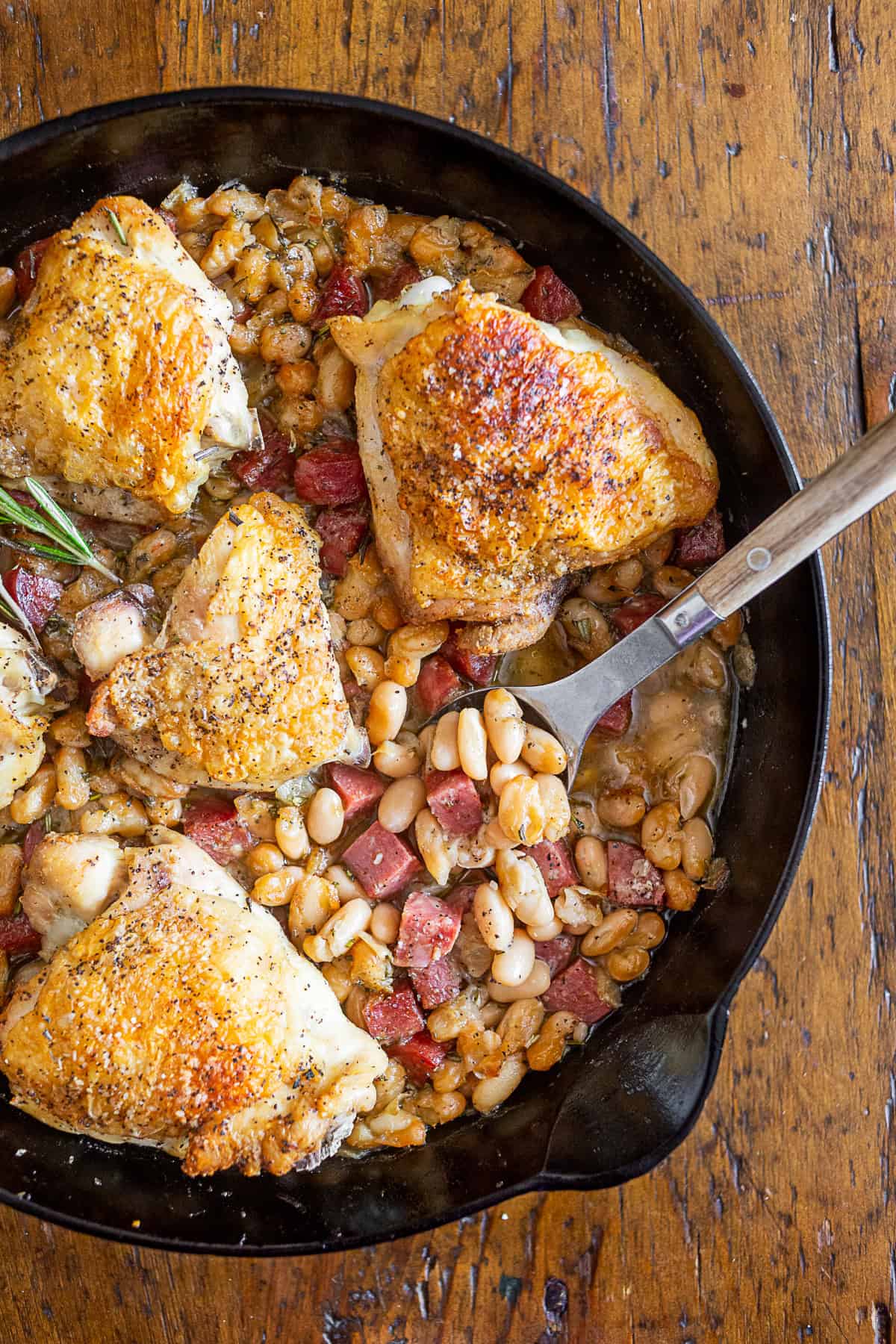 Chicken Cannellini Bean Skillet in a cast iron skillet. 