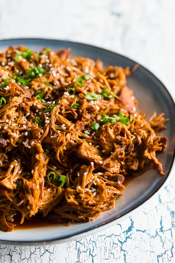 Slow Cooker Honey Sriracha Pulled Chicken on a plate. 