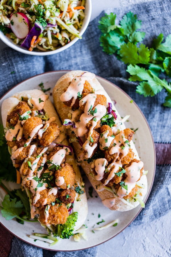 Asian Shrimp Po Boy Sandwich drizzled with spicy mayonnaise.