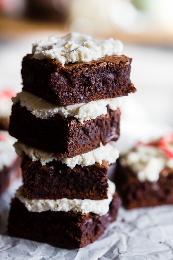 These espresso chocolate chip brownies are super fudgy and topped with a homemade fluffy vanilla bean buttercream. These are the type of brownies that will have you sneaking into the kitchen at midnight for a snack. Plus they are super simple to make!