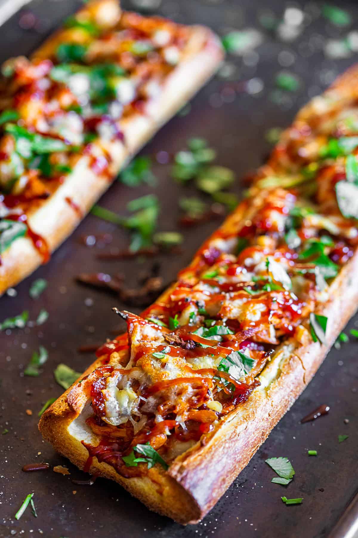 BBQ Chicken French Bread Pizza topped with cilantro.