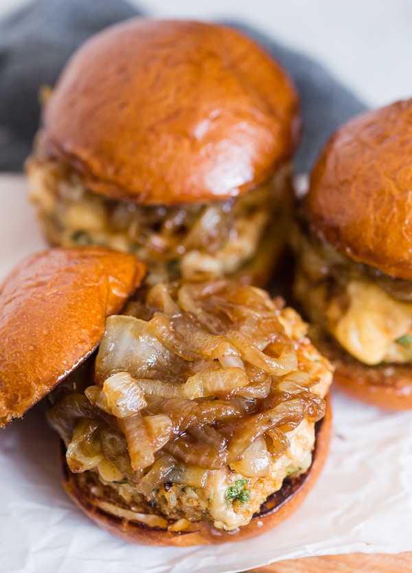 Apple Butter Onion Chicken Burgers topped with extra onions. 