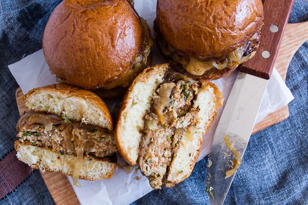 These apple butter onion chicken burgers are the perfect game day and outdoor grilling burgers. They are packed full of sweet apple butter flavor and pair perfectly with smoked Gouda cheese and homemade apple butter caramelized onions. You’ll love these burgers!