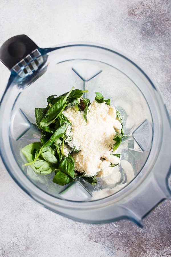 Pesto ingredients in blender. 