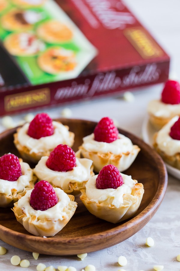 No Bake White Chocolate Cheesecake Bites on a table.