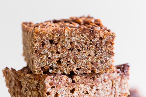 Peanut Butter Nutella Rice Krispie Treats sliced to show the sides. 