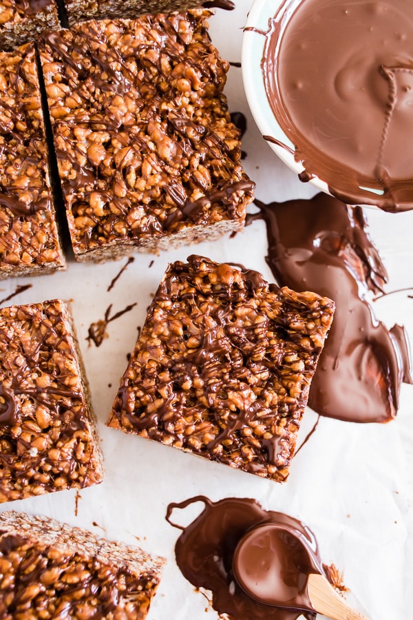 Peanut Butter Nutella Rice Krispie Treats sliced on parchment paper. 