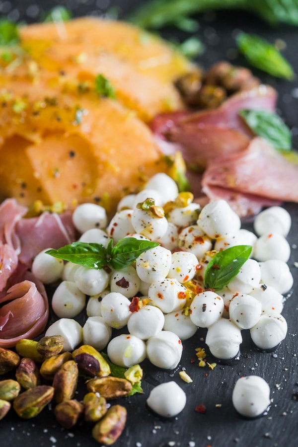 Cantaloupe Caprese Salad on a serving plate. 