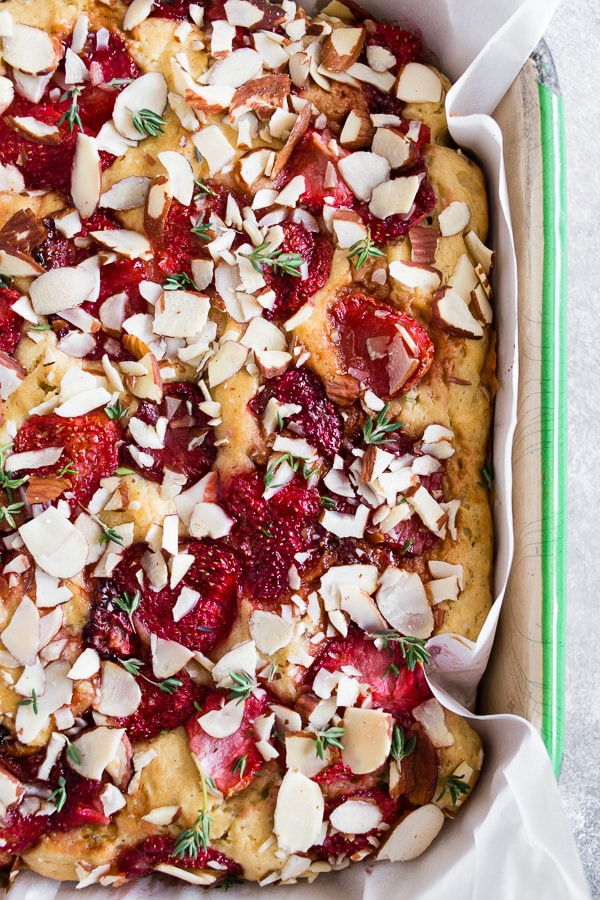 Roasted Strawberry Olive Oil Cake in a metal baking dish. 