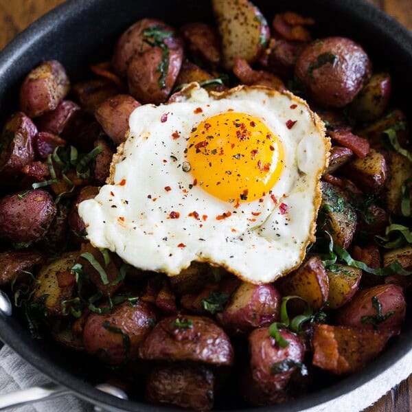 This basil bacon hash is the perfect way to start the day. Full of crispy red potatoes, fresh basil flavor and topped with a runny egg.