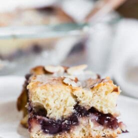 This cherry fritter cake is packed full of summer flavor. A fresh cherry filling that is sandwiched in between a moist cake and topped with a vanilla bean glaze. You’re going to go crazy for this cake!