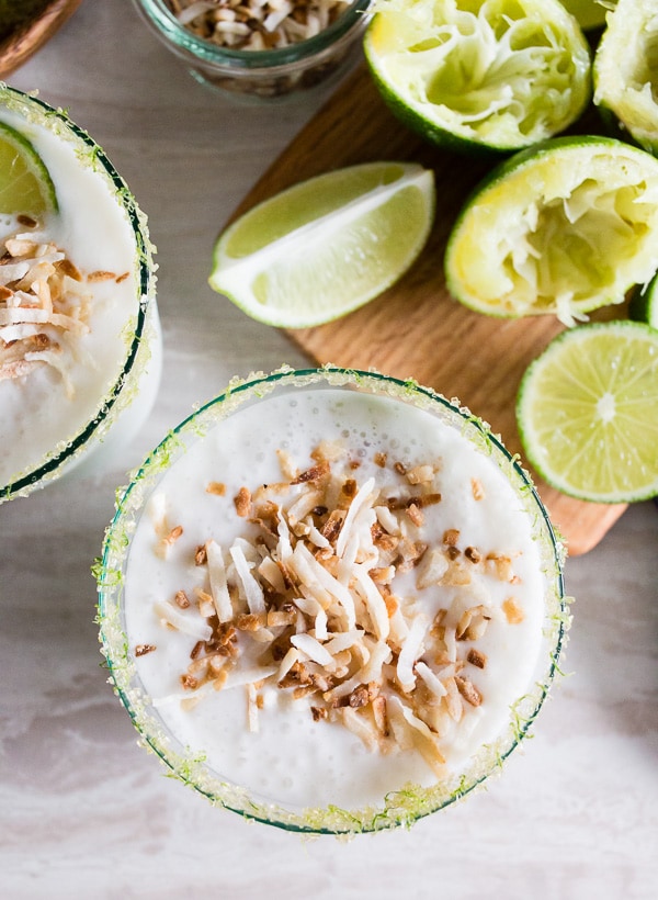coconut lime frozen margarita served with toasted coconut.