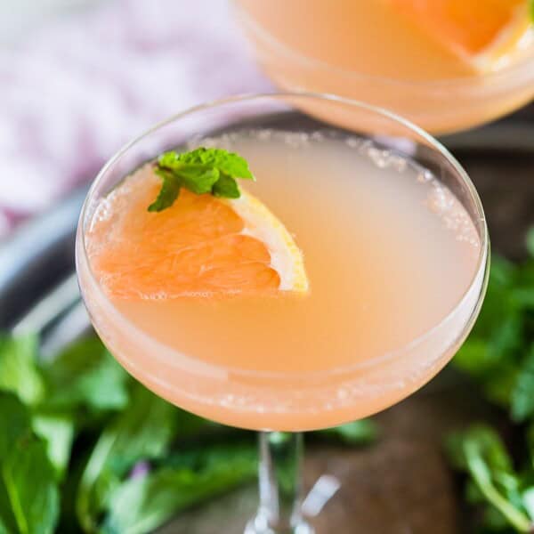 This grapefruit Campari rose water cocktail is your new summertime jam! Light and refreshing with soft subtle floral notes. You'll love all the flavor packed in this cocktail!
